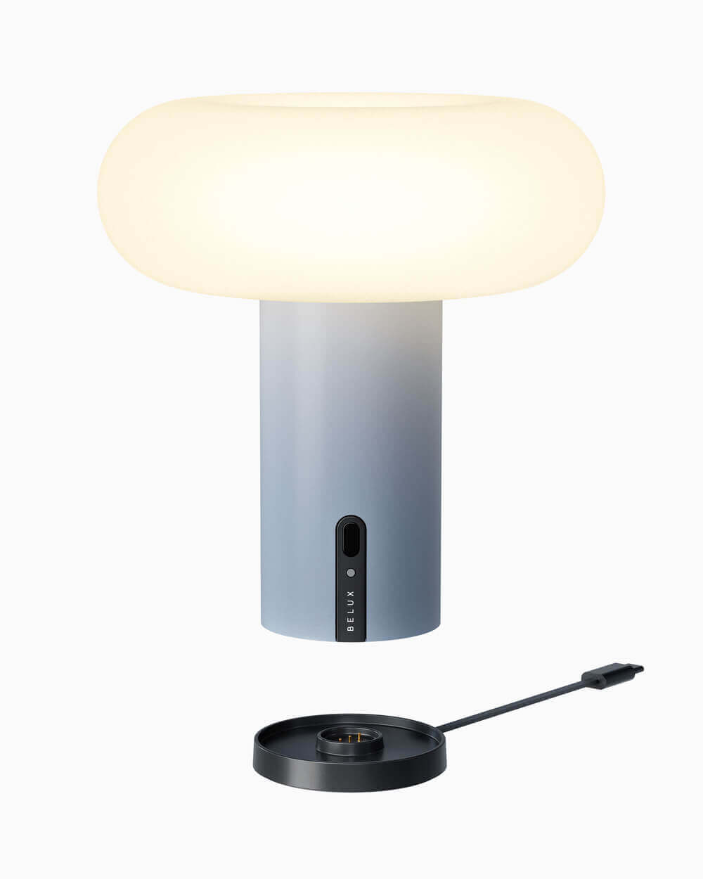 Oto Portable Lampe von Belux mit sanfter, runder Leuchte und grauem Sockel.