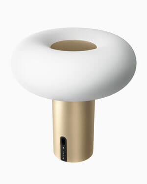 Oto Portable Lamp by Belux with white lampshade and gold base.